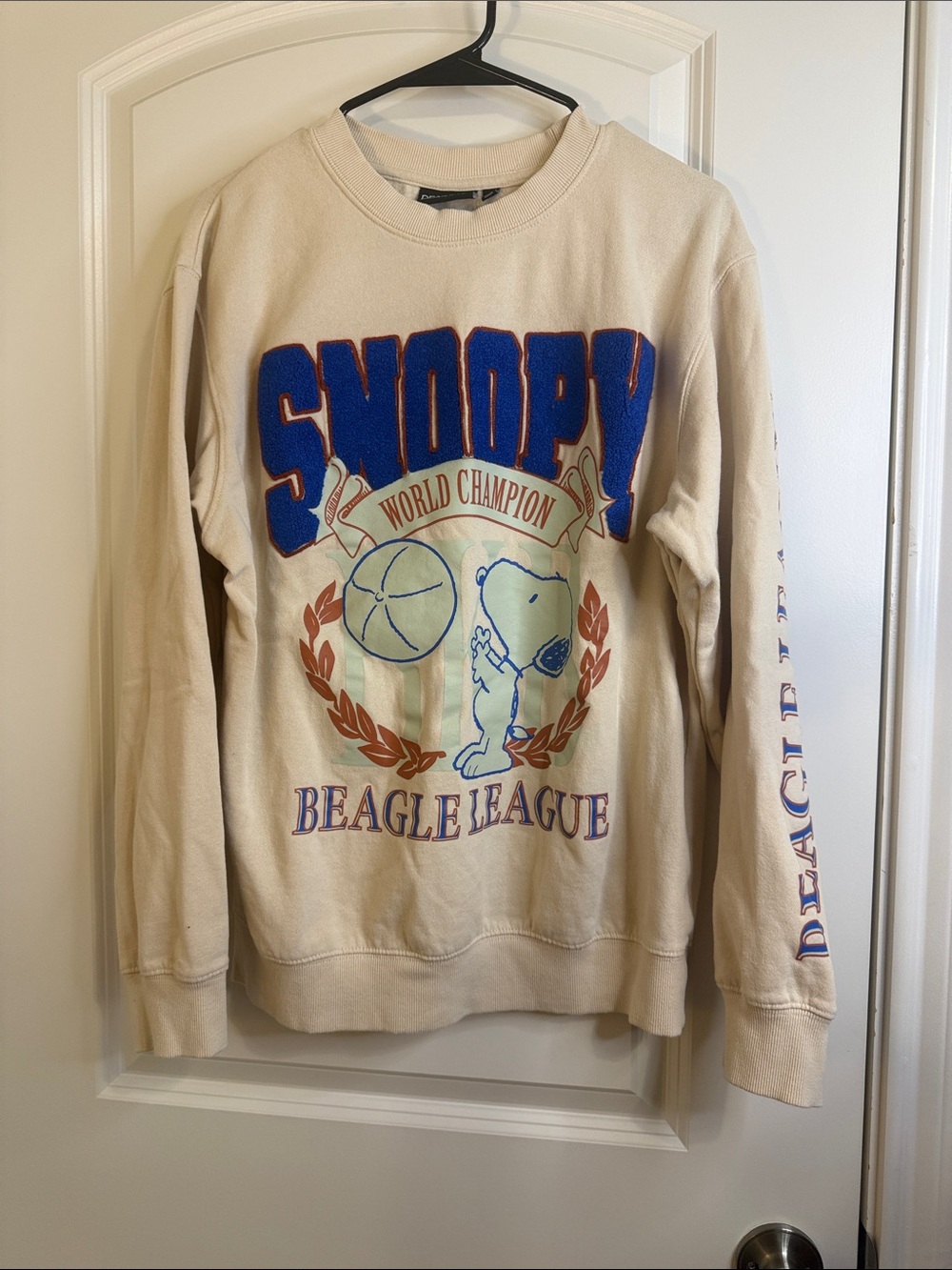 Peanuts Cream Crewneck Sweatshirt with Blue Snoopy Graphic